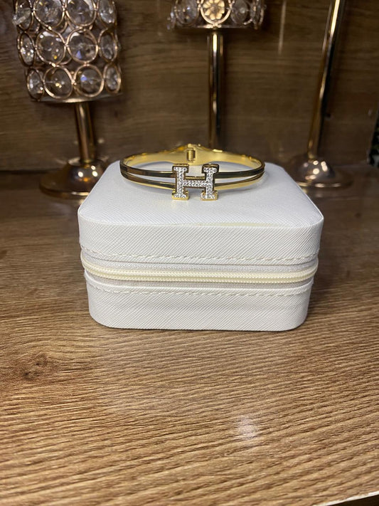 luxury-style gold-tone bangle bracelet